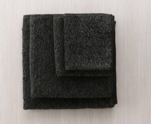 Kishu Bichotan Towel is impregnated with charcoal , an odor-eliminating agent, they are 87% cotton, 13% rayon and made in Japan.